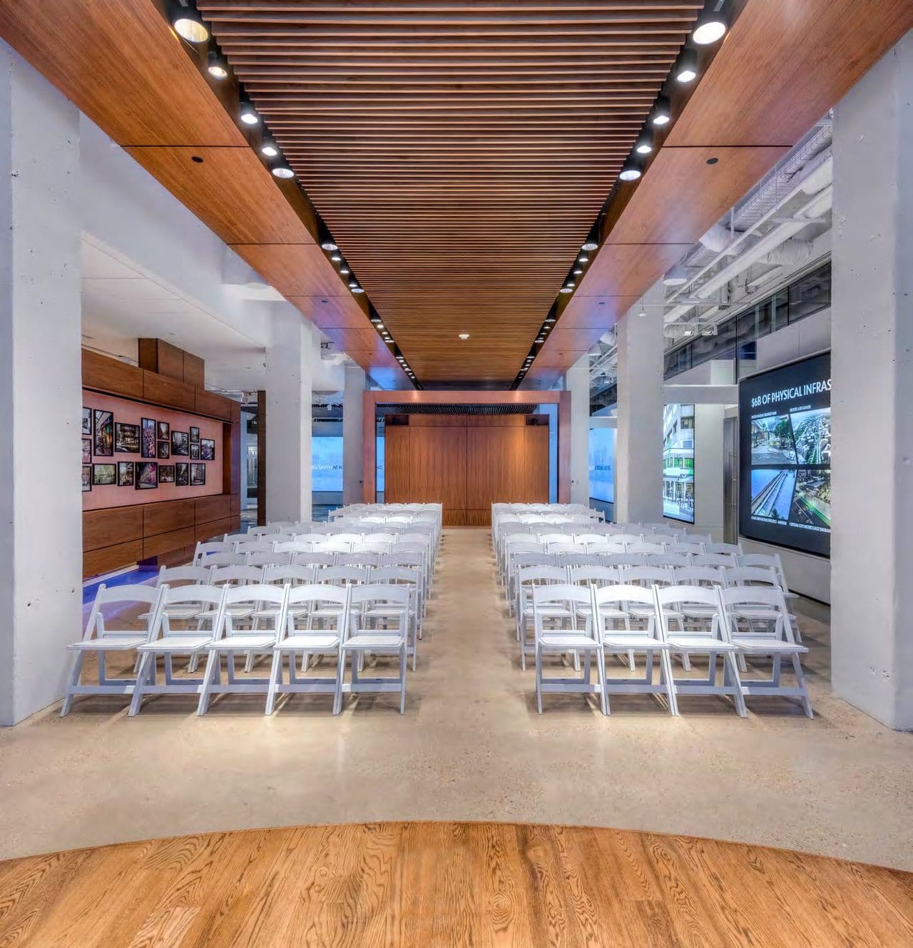 Rows of chairs facing the stage in the Display Hall